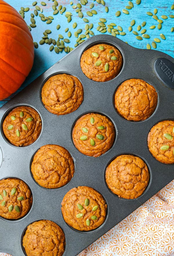 Dairy-Free Pumpkin Muffins in a muffin tin.