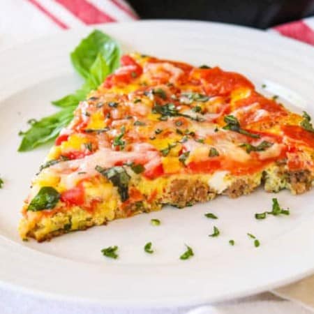 Slice of Meat Lover's Pizza Frittata on a plate.