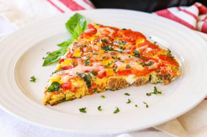 Slice of Meat Lover's Pizza Frittata on a plate.