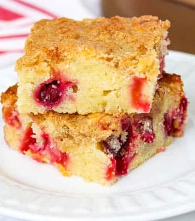 Two slices of Cranberry Coffee Cake on a plate.