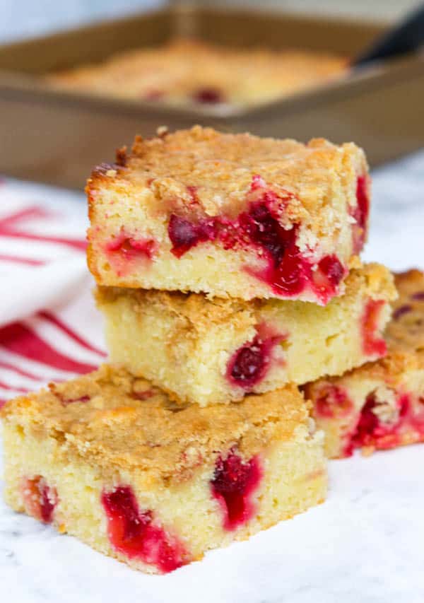 Stacked slices of Cranberry Coffee Cake.