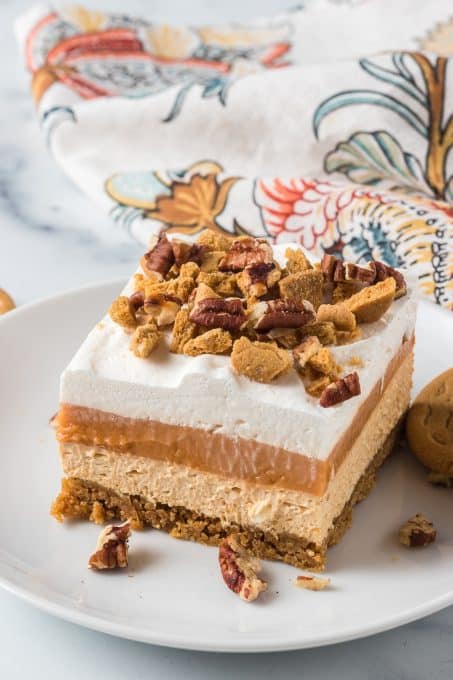Pumpkin Bars with cheesecake, pumpkin pudding and Cool Whip.
