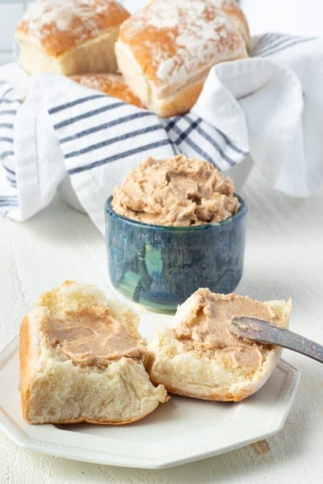 Honey Butter with cinnamon spread on a roll.