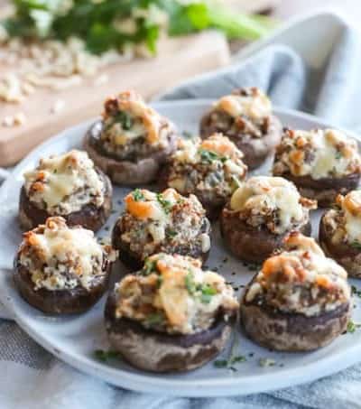 Cheesy Sausage Stuffed Mushrooms on a plate.