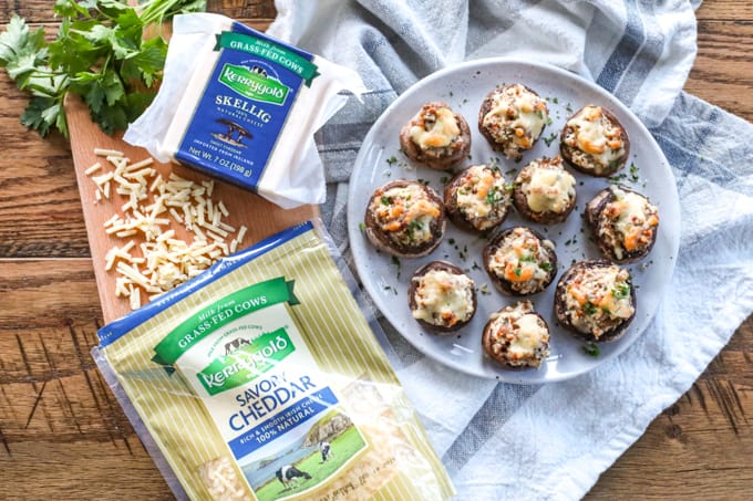 A plateful of Cheesy Sausage Stuffed Mushrooms with Kerrygold cheeses.