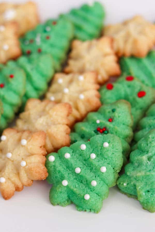 Baked Spritz Cookies - green trees and snowflakes. Baked Spritz Cookie recipe.