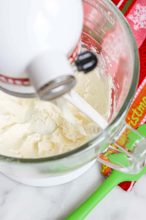 Beating the cream cheese and shortening for Spritz Cookies. Beating the cream cheese and shortening for Spritz Cookies.