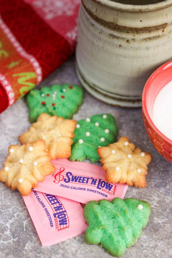 Packets of Sweet'N Low@ with Classic Spritz Cookies. Spritz Cookies Recipe made with Sweet'N Low®.