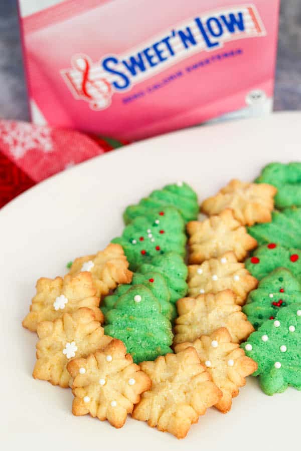 Spritz Cookies on a plate with a Sweet'N Low® box.