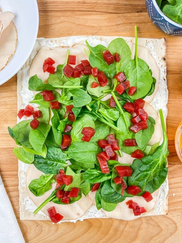 Beets, spinach, turkey for a Beet, Turkey, and Cheese Wrap.