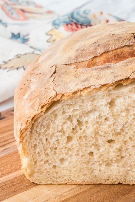 A soft loaf of bread with a crunchy and chewy crust.