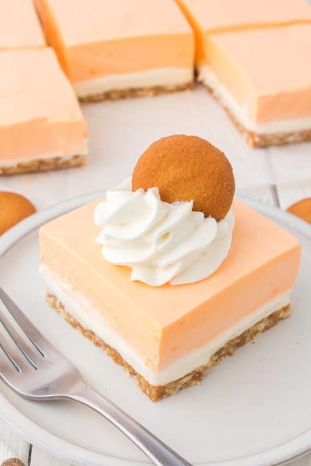 Nilla wafer crust, vanilla cheesecake, and an orange cream topping.