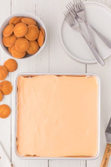 The top layer of a no bake orange dream bar.