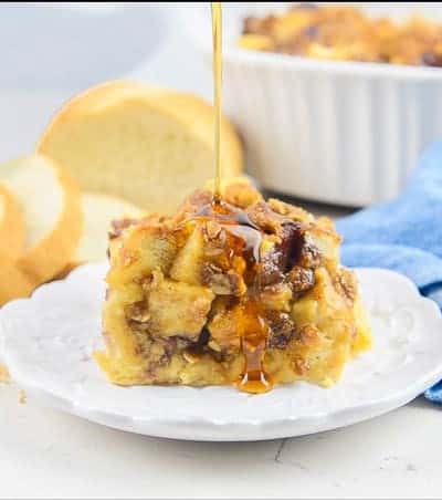 Syrup drizzled on Peanut Butter and Jelly French Toast Casserole.