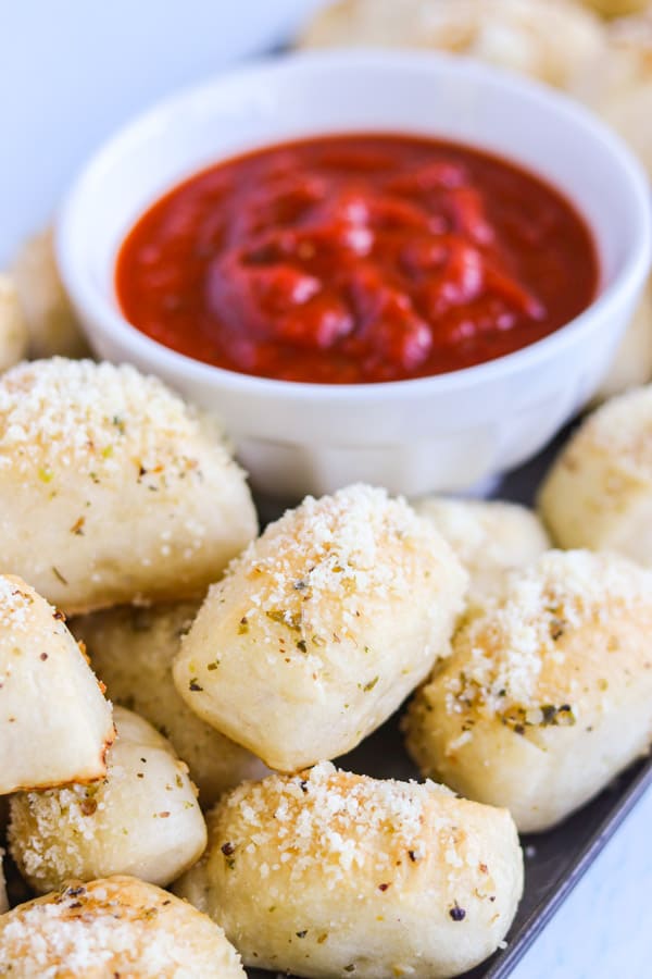 Parmesan Bread Bites with a bowl of marinara.