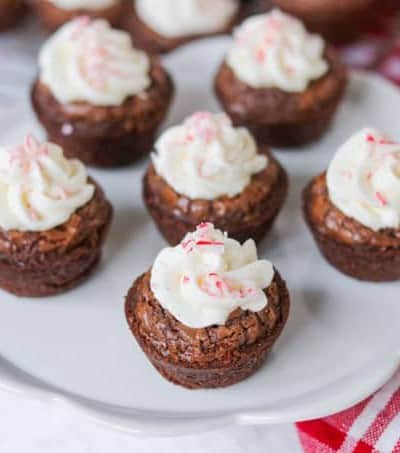 A plate full of bite size desserts.