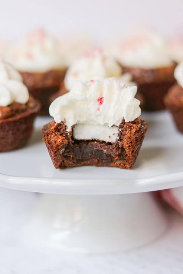 A bite taken out of a Surprise Inside Peppermint Brownie Bite.