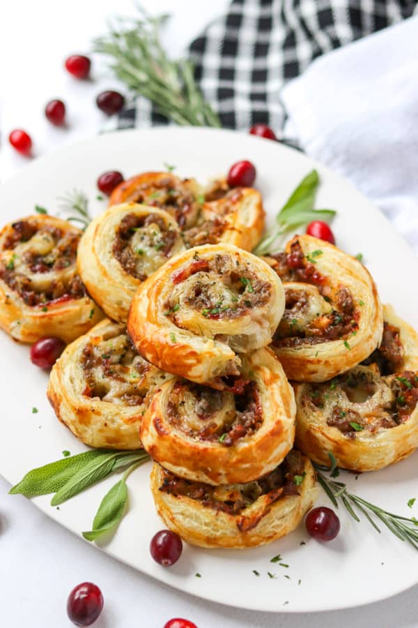 Sausage, Cranberry, Brie Bites on a plate ready to be served.