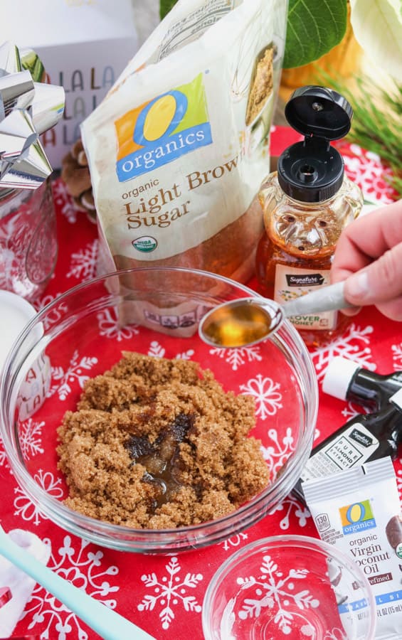 Adding honey to a brown sugar exfoliator.