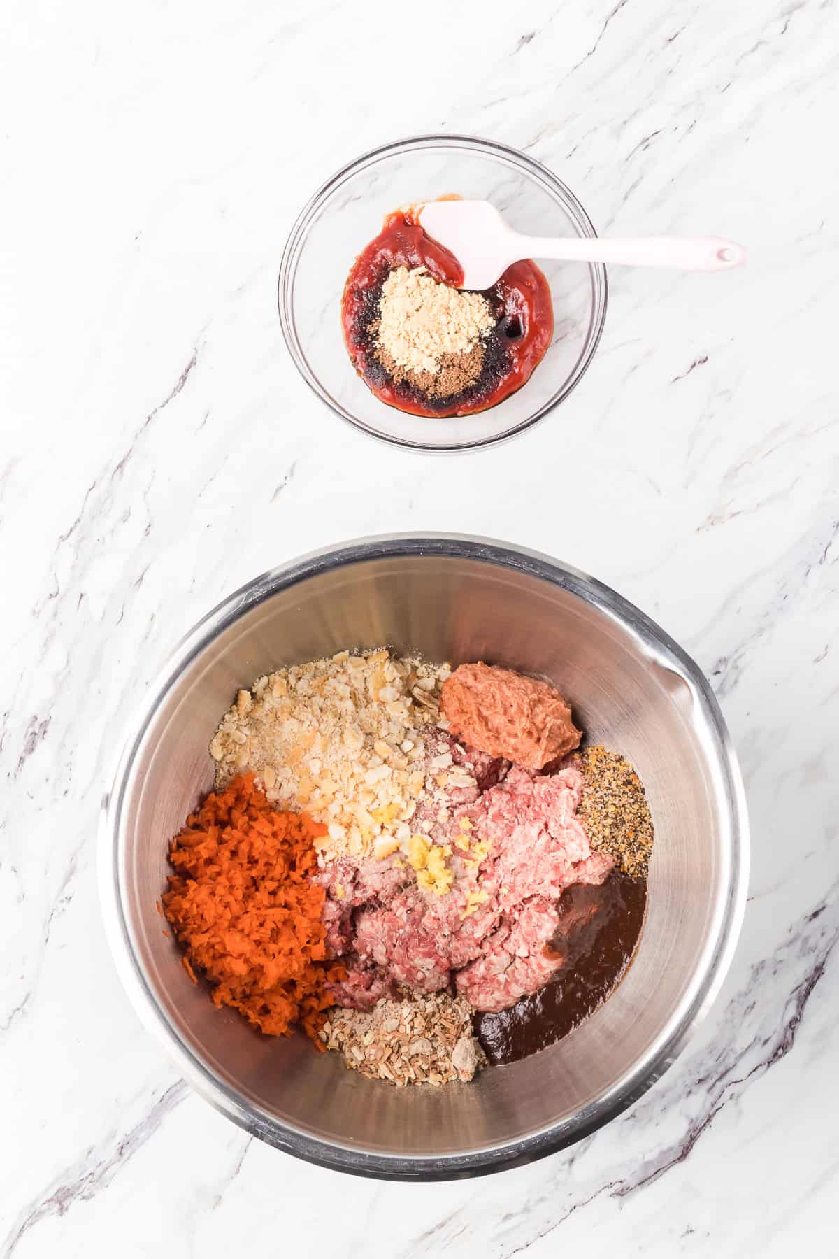 Mixing a meatloaf ingredients together.