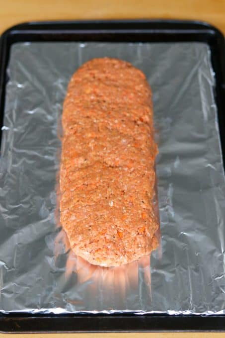 A loaf of meat before being baked.