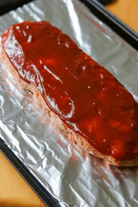 The glaze on top of the loaf of meat, ready for the oven.