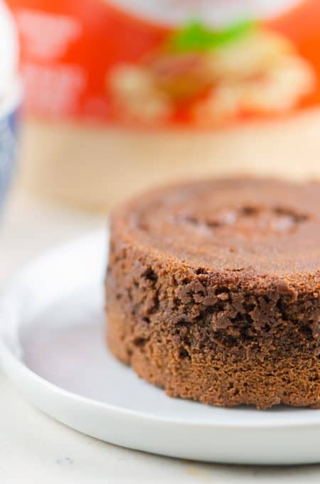 A baked chocolate lava cake with peanut butter in the center.