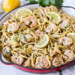 A pan of pasta with shrimp.