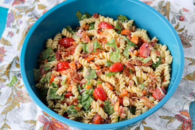 A bowl full of pasta salad.