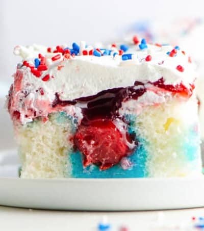 Patriotic Poke Cake with cherry fruit filling.