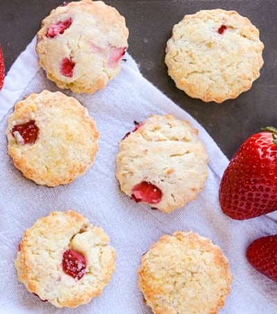 An tray of scones made with strawberries, cream cheese and lemon zest.