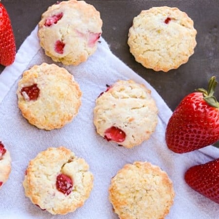 An tray of scones made with strawberries, cream cheese and lemon zest.
