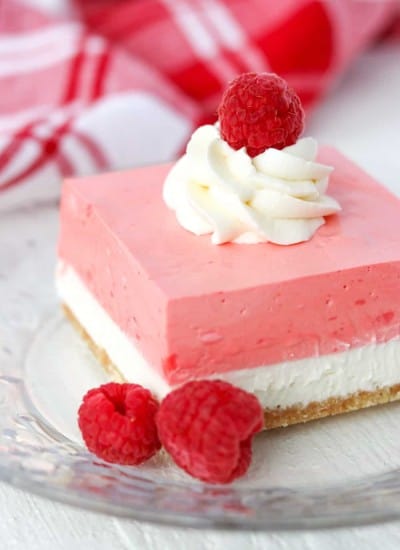 Sweet delicious layers in a creamy raspberry no bake jello dessert.