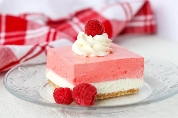 No Bake Raspberries and Cream dessert with a creamy layer of raspberry jello.