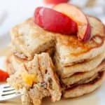 A bite of Cinnamon Peach Pancakes.