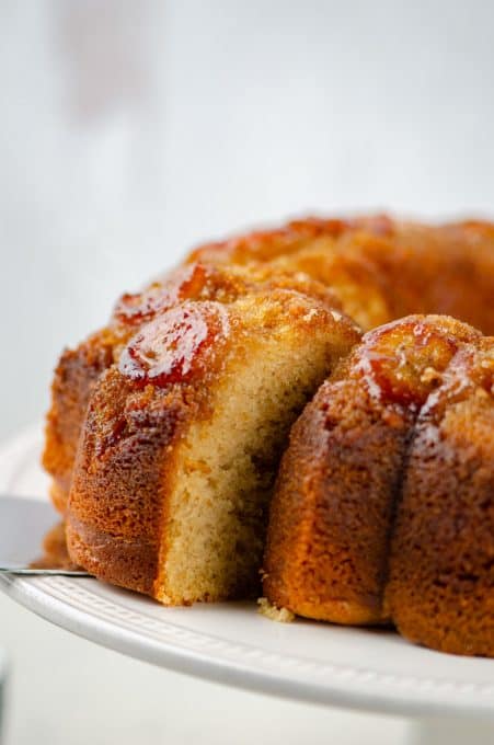 Peanut Butter Banana Cake on a cake plate.