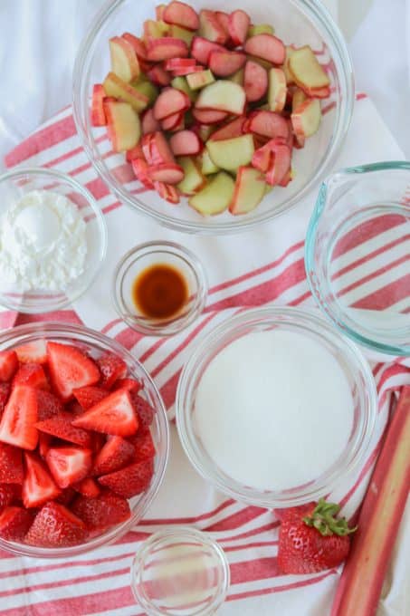 Strawberries, rhubarb and other ingredients for skillet crisp.