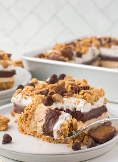 A forkful of no bake peanut butter chocolate dessert.