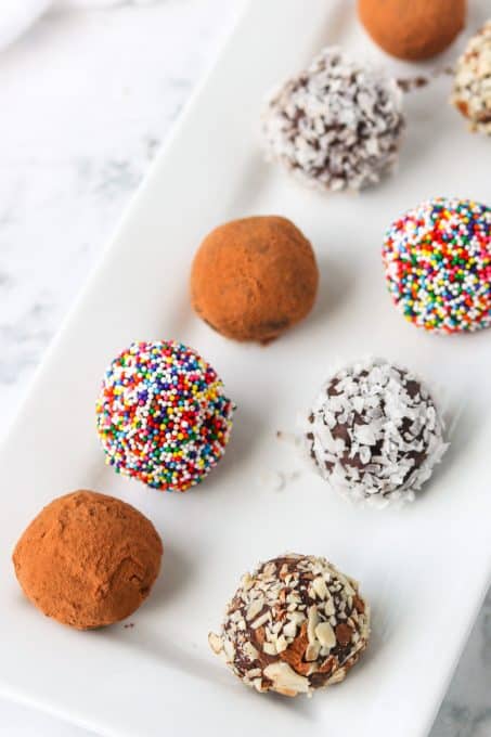 Small balls of chocolate ganache covered in a variety of coatings.