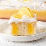 Lemon Poke Cake with Marshmallow Frosting.