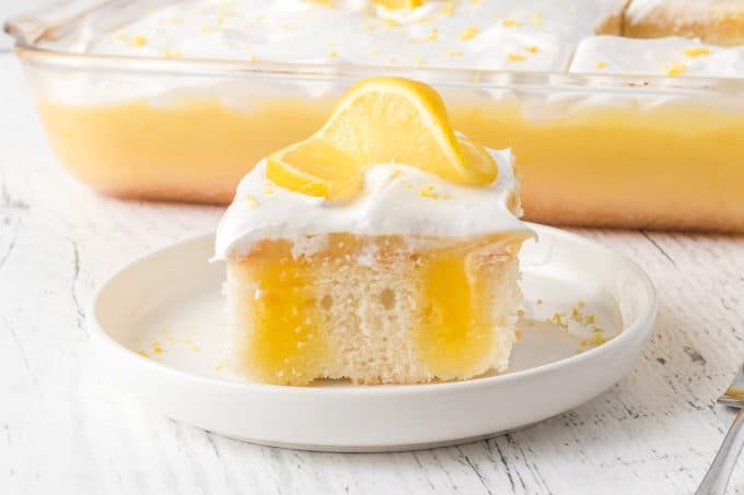 Lemon Poke Cake with Marshmallow Frosting.