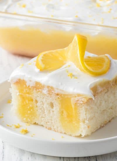 Lemon Poke Cake with Marshmallow Frosting.