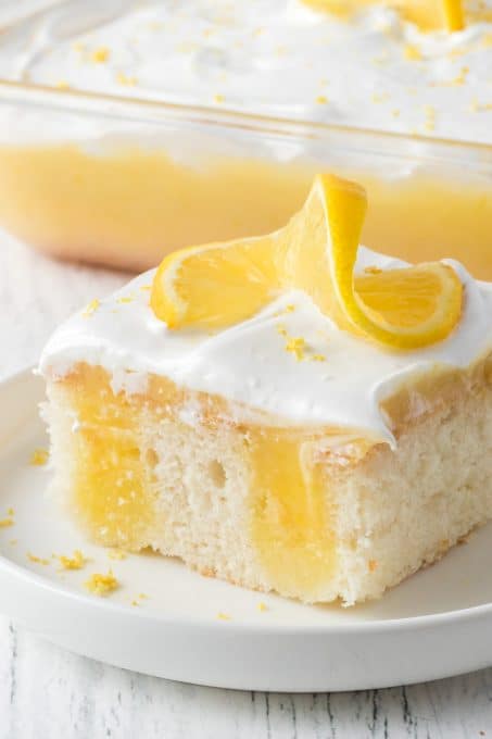 Lemon Poke Cake with Marshmallow Frosting.
