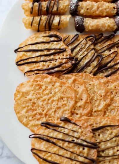 Cookies drizzled and dipped in chocolate.