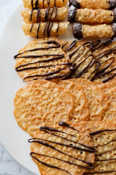 Cookies drizzled and dipped in chocolate.