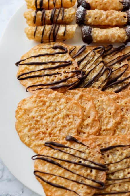 Cookies drizzled and dipped in chocolate.