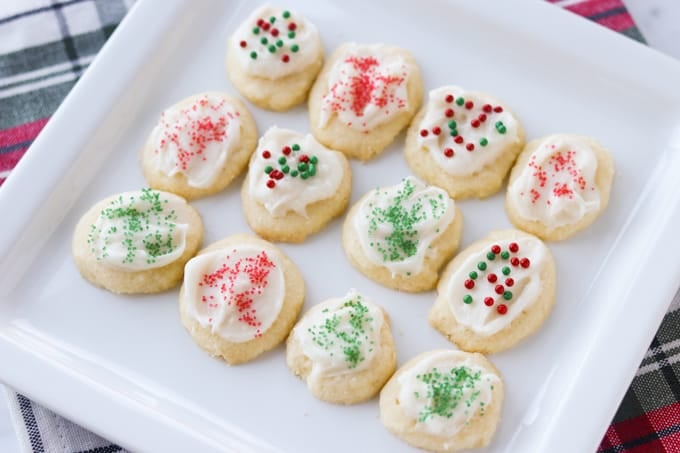 Frosted sugar cookies with cream cheese.