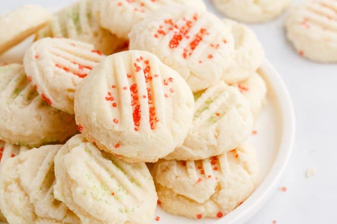 A plateful of cookies. with sprinkles.