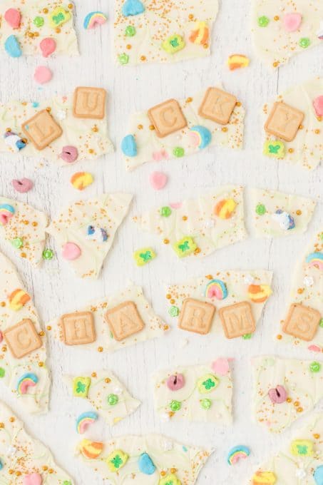 Pieces of white chocolate with Lucky Charms cereal.