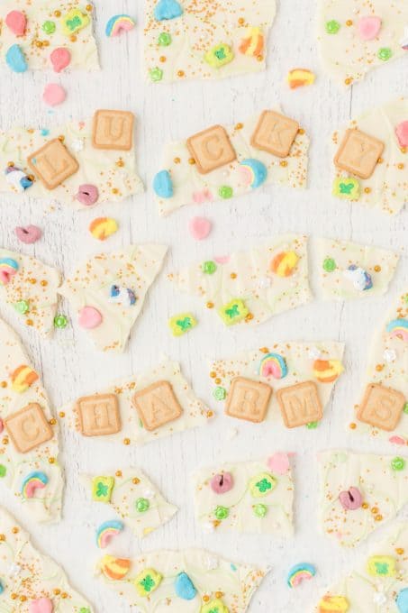 Pieces of white chocolate with Lucky Charms cereal.